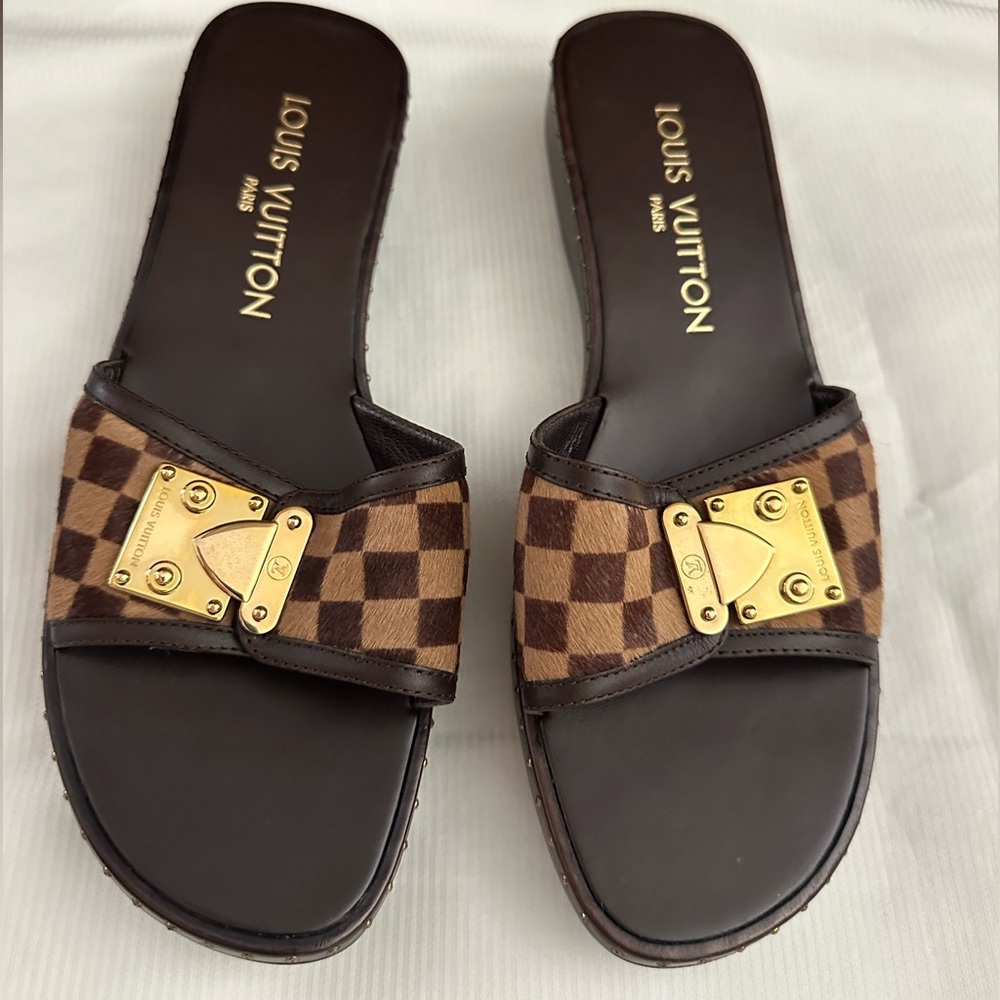 NWT Vintage Louis Vuitton
Calf Hair Plaid Print Slides